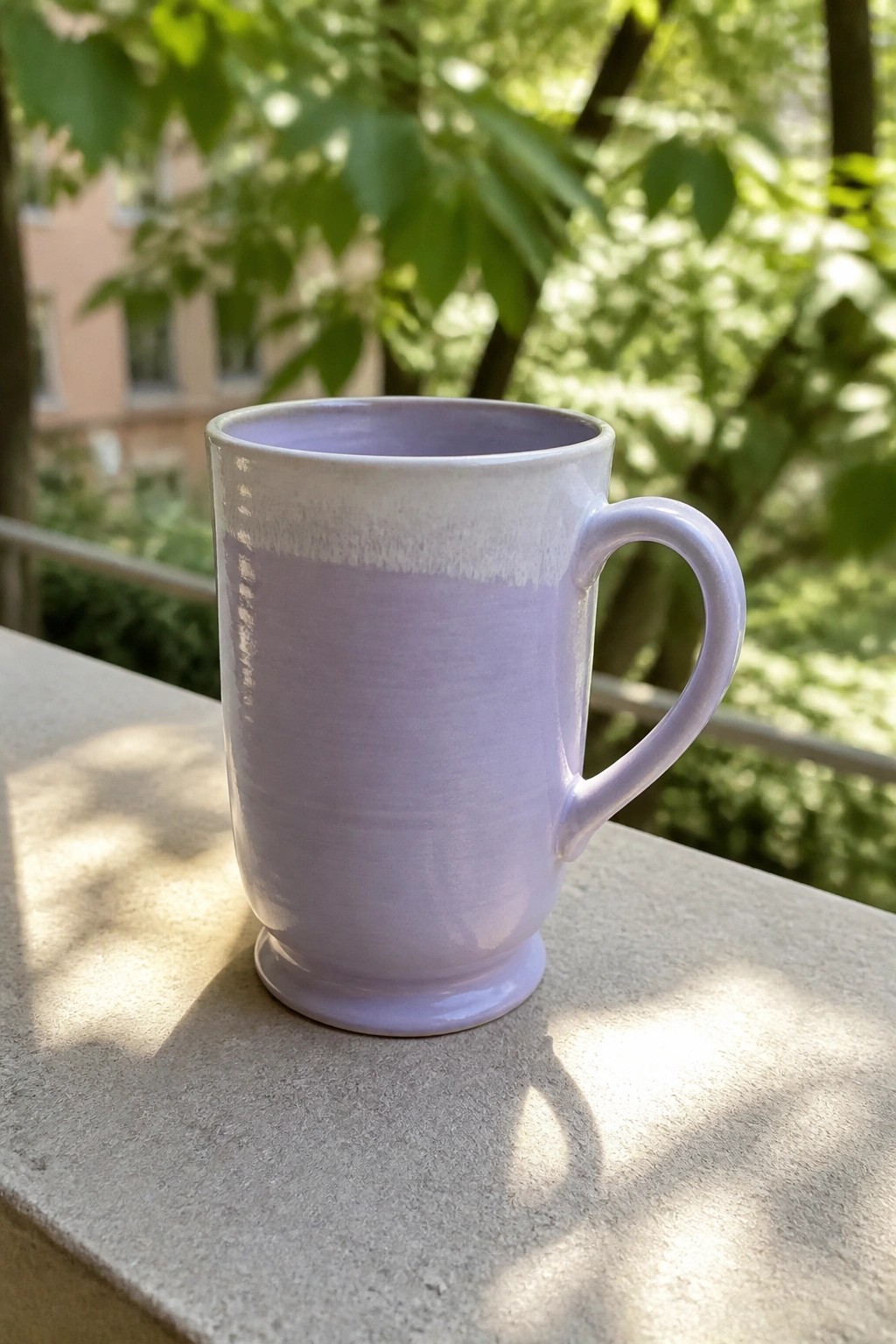 Light purple ceramic mug with handle on sunlit stone ledge outdoors