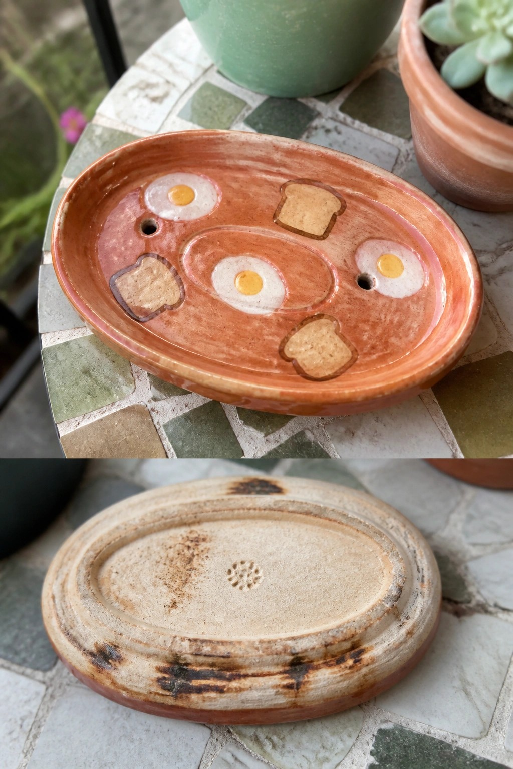 Handmade reddish ceramic tray with egg and toast motifs, shown front and back on tiles.